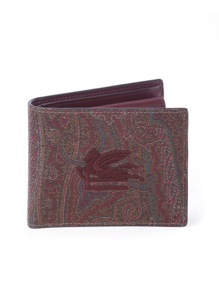 Shop ETRO  Portafoglio: Etro small wallet made in the iconic Paisley jacquard canvas, enriched by the thread-embroidered ETRO Pegaso logo with a three-dimensional effect.
Dimensions: 11 x 9cm
Exterior: Paisley jacquard cotton fabric coated with matte grain and doubled in canvas.
Inside: 100% calf leather.
Lining: 100% nylon.
Embroidery: 100% polyester.
Compartment for banknotes.
Three card slots.
Three flat pockets.
Flap coin purse with snap button.
Made in Italy.. 1N371 7863-0600